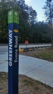 Crabtree Creek Greenway trail marker at Evans road.