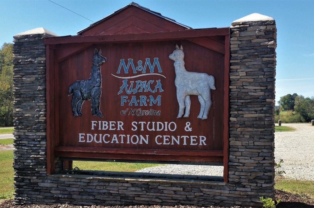 Entrance sign at M&M Alpaca Farm
