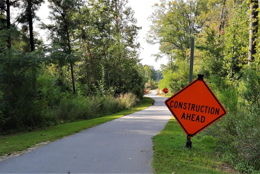Construction sign along the White Oak Creek Greenway at Lake Crabtree.