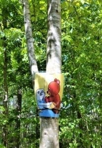 Handwashing cartoon on a tree on the Black Creek Greenway, Cary NC