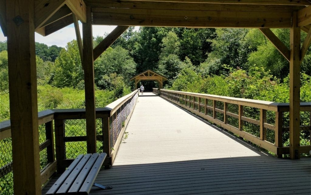 The Wetlands Boardwalk features several covered areas with benches.