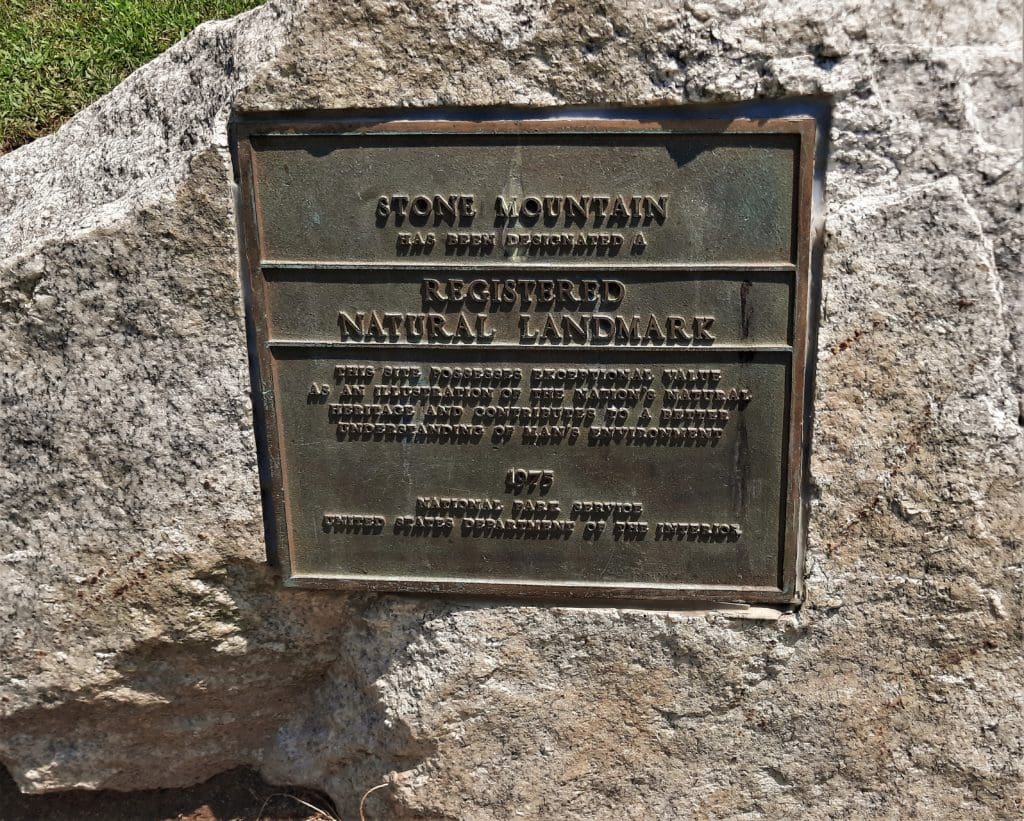 Registered National Landmark plaque on a boulder in the Hutchinson Homestead area.