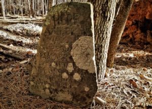 Old gravestone alongside the MUT in Umstead State Park.