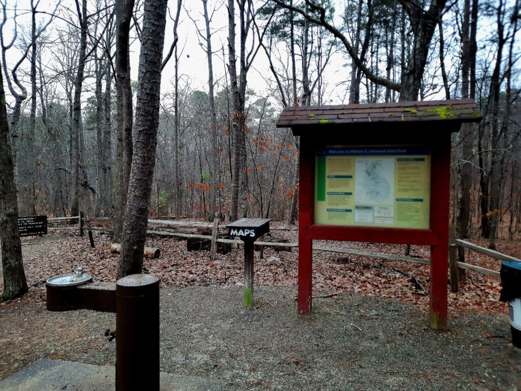 Kiosk and maps at a trail head in Umstead State Park.